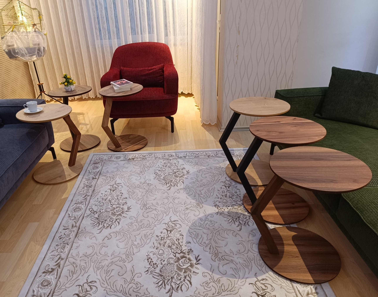 A modern C-shaped side table designed to stay right by their side