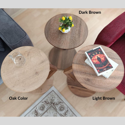 A modern C-shaped side table designed to stay right by their side