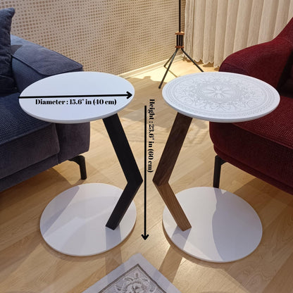 A modern C-shaped side table designed to stay right by their side